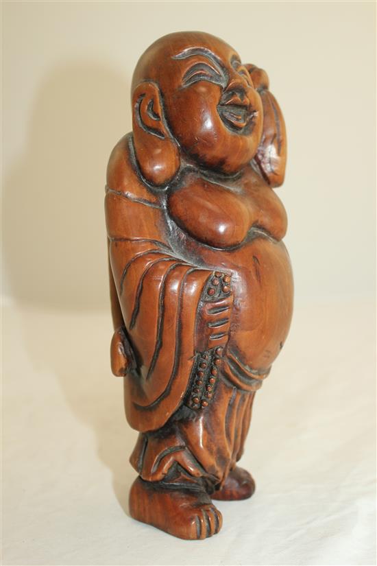 A Chinese boxwood carving of Budai, 22cm